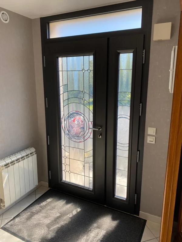 Pose d’une porte d’entrée Bel’m dans la manche à Saint-Lô